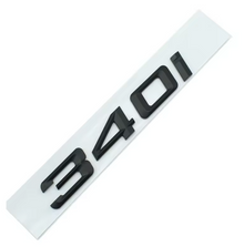 LOGO DE COFFRE 340I NOIR BRILLANT A COLLER MPARTS AUTO